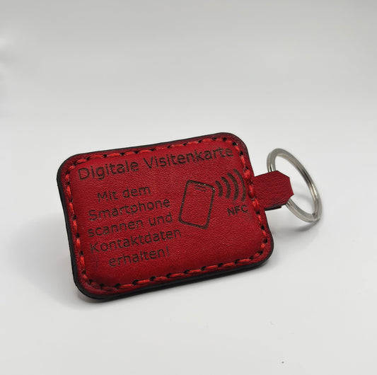 Roter NFC-Schlüsselanhänger aus Leder – Symbol für moderne digitale Visitenkarten von EngelzKind als Alternative zur klassischen Papierkarte.